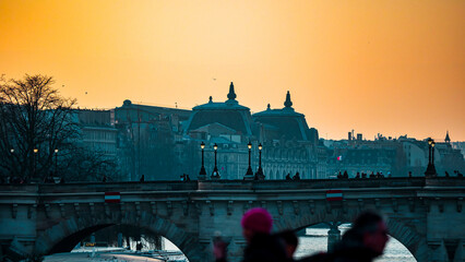 Sunset over the Seine in Paris. Silhouettes of bridges.