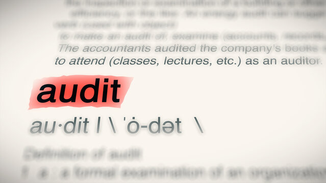 A close-up illustration of the word "audit" in a dictionary, showing its definition and meaning