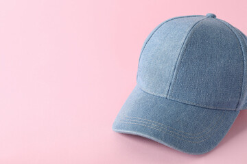 Stylish denim baseball cap on pink background. Mockup for design