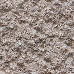 Plastered wall with stones