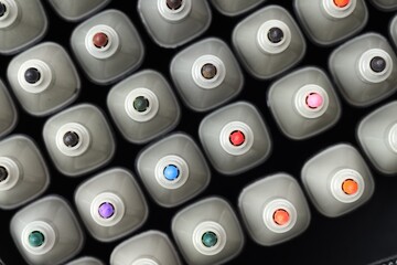 Many colorful markers in bag, top view