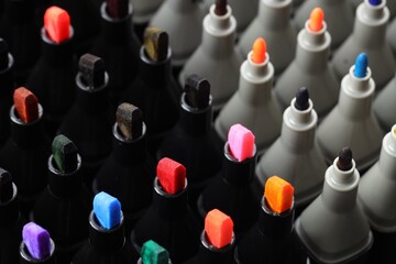 Many colorful markers as background, closeup. Art supplies © New Africa