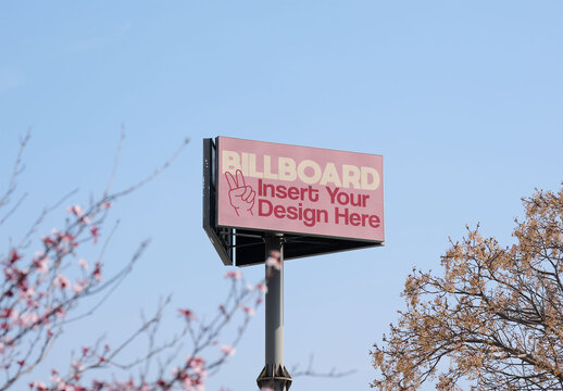 Blank Billboard bulletin Against Clear Blue Sky With Distant Trees