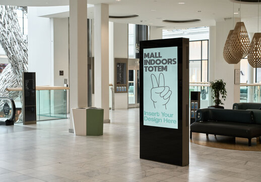 An advertising panel in a bright shopping center offers visitors essential information in a spacious setting.