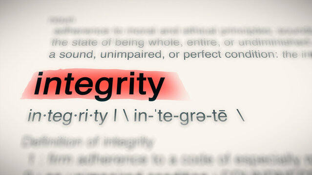 A close-up illustration of the word "integrity" in a dictionary, showing its definition and meaning