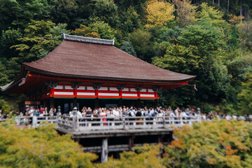 Kiyomizu-dera buddhist temple in Kyoto prefecture, Japan, Higashiyama ward, autumn fall view with mountains, Kyoto streets and skyline, shrine and pagoda, travel to Japan, Kansai region