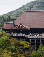 Kiyomizu-dera buddhist temple in Kyoto prefecture, Japan, Higashiyama ward, autumn fall view with mountains, Kyoto streets and skyline, shrine and pagoda, travel to Japan, Kansai region