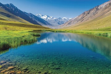 Fototapeta premium Tranquil lake reflects mountains, surrounded by lush greenery an