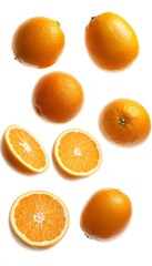 Fototapeta premium Composition of whole and halved oranges on a white background
