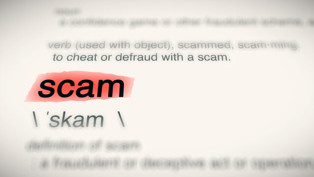 A close-up illustration of the word "scam" red-highlighted in a dictionary, showing its definition and meaning