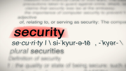 A close-up illustration of the word "security" red-highlighted in a dictionary, showing its definition and meaning