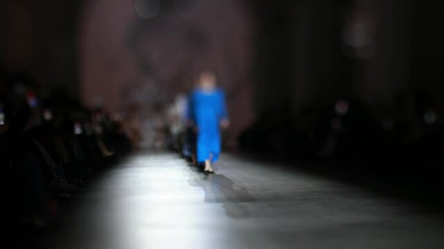 Fashion runway out of focus. The blur background
