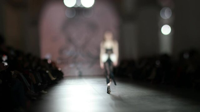 Fashion runway out of focus. The blur background