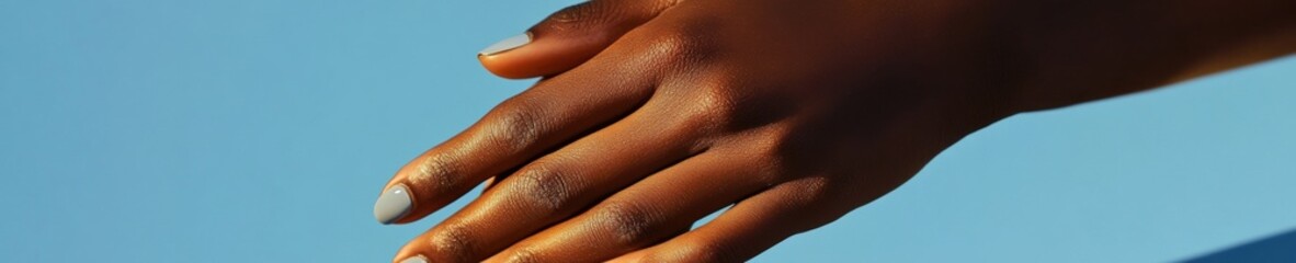 Fototapeta premium Modern Nail Artistry Minimalist Manicure with Jewelry Accents on Neutral Palette Professional Beauty Services and Trendsetting Fashion Editorial for Digital Marketing