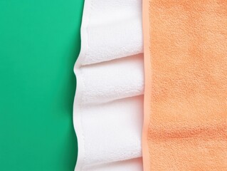 Obraz premium Colorful Towel Display Showcasing Soft Textures on Vibrant Backdrop - Modern Design Content for Spa Merchandising and Home Decor Styling