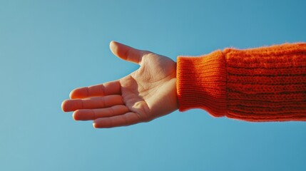Vibrant Healthcare Support Visual Outstretched Hand in Cozy Knit Against Blue Sky - Engaging Medical Promotion and Human Connection Messaging for Patient-Centric Services