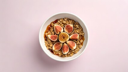 plant-based breakfast + granola + homemade A bowl of granola topped with fresh figs, beautifully arranged on a pink background.