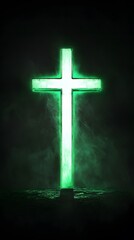 A glowing green crystal cross on a black background
