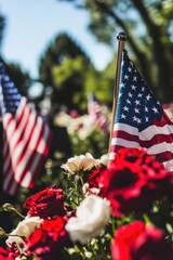 Solemn tribute honoring fallen heroes with flags and flowers in peaceful cemetery setting