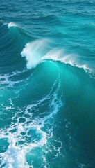 Fototapeta premium Deep blue turquoise sea with strong wave movement and sea foam, ocean waves, turquoise blue ocean
