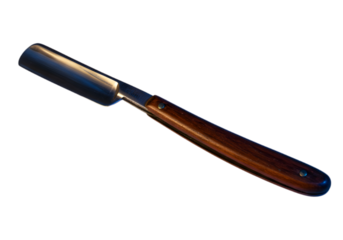 Vintage Straight Razor with Wooden Handle on Dark Background Showing Timeless Grooming and Shaving Tradition