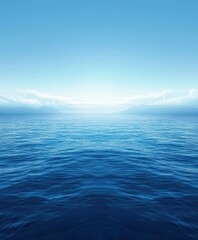 Obraz premium A serene aerial view captures a tranquil ocean under a clear blue sky, showcasing nature's beauty and peacefulness.