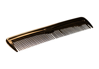 Close-up shot of an orange hair comb on a contrasting dark background