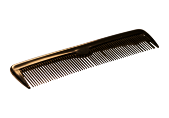 Close-up shot of an orange hair comb on a contrasting dark background