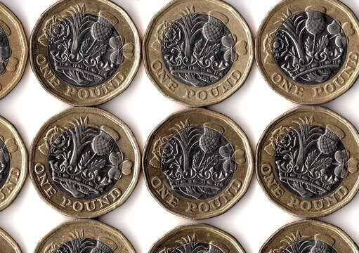 The reverse side of modern one pound coind from the United Kingdom.