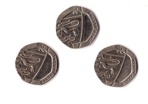 The reverse side of modern twenty pence coins from the United kingdom.