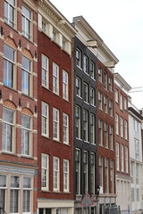 Amsterdam Amstel Street View with Brick House Facades, Netherlands