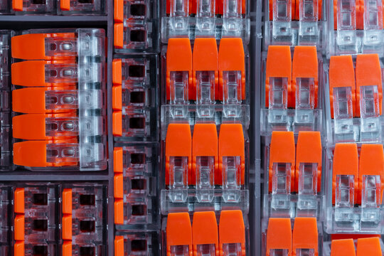 Plastic storage box for different types of electrical wire connectors. Mini quick connector for wires. Universal wire connector terminal, different ports