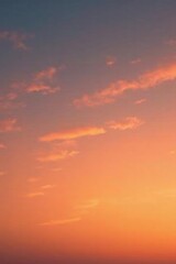 Obraz premium Thin wispy clouds scattered against a brightening orange sky, sky, nature, peaceful