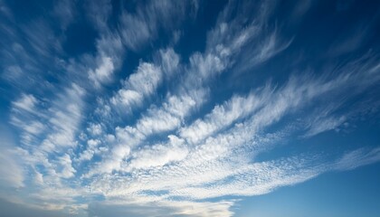 White spreading blurred clouds move across the sky in the morning