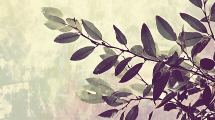 A detailed shot of a tree branch with several leaves