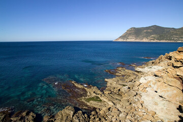 sea and rocks Cliffs at Porto Ferro Porticciolo, Alghero, Sardinia.