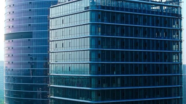 Aerial view of modern glass curtain wall building and office building