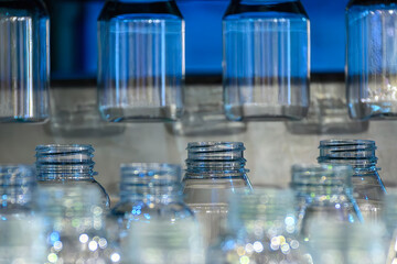 The plastic bottle manufacturing process by vertical blow mold machine.