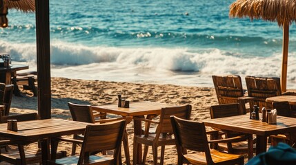 Fototapeta premium A rustic beach caf scene with large wooden tables and comfortable chairs, with the waves gently lapping the shore.