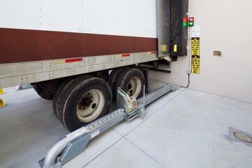 Truck wheels Locked at loading dock © Francisco