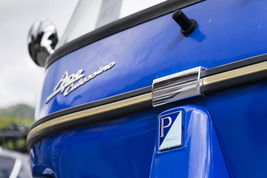 LIVIGNO, ITALY - AUGUST 1: Limited edition model of three-wheeled vehicle Piaggio Ape Calessino stands on street on 1 August 2016 in Livigno, Italy.