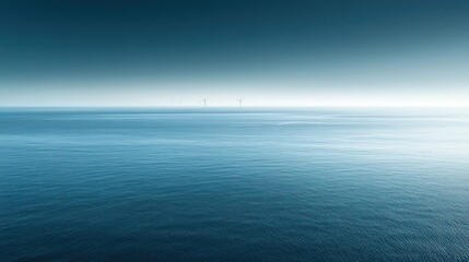 Obraz premium Offshore Wind Turbines on a Calm Ocean