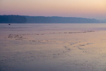 beautiful winter sunrise over the lake. frozen lake.