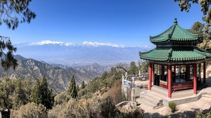 Mountaintop Pavilion Overlooking Snow Capped Peaks