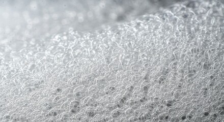 Obraz premium Macro photograph of soap bubbles, extreme close-up, white foam, delicate texture, minimalist composition, soft focus, abstract patterns, light gray background