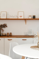 Stylish kitchen design in a modern apartment with boho decor and minimalist features