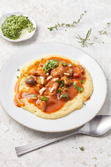 Seitan and Tomato Stroganoff with Herb Pesto and Creamed Polenta