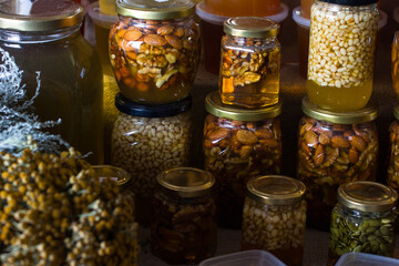 nuts in honey. In banks on market shelves