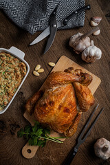 Tasty Whole Roasted Chicken on Rustic Wood