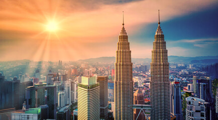 Aerial view of Kuala Lumpur city skyline at sunset in Kuala Lumpur, Malaysia.